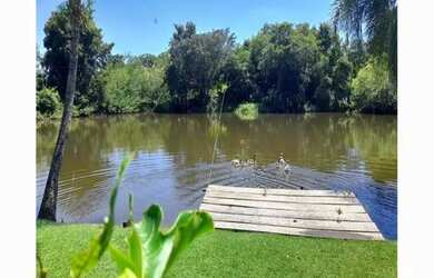 Imagem: A casa em condomínio possui 4 Dormitórios, 5 Banheiros, 5