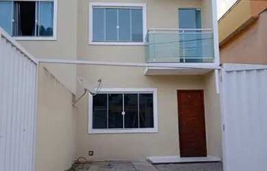 Imagem: A casa possui 2 Dormitórios, 3 Banheiros, 1 Vaga na garagem