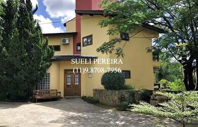 Imagem: A casa em condomínio possui 4 Dormitórios, 5 Banheiros, 5