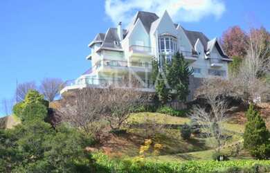 Imagem: A casa em condomínio possui 4 Dormitórios, 5 Banheiros, 5