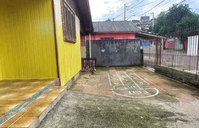 Imagem: A casa e possui 2 Dormitórios, Suítes, 1 Banheiro, 1 Vaga
