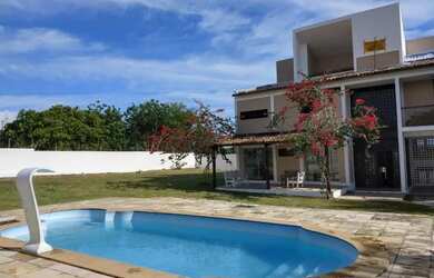 Imagem: A casa possui 5 Dormitórios, 5 Banheiros, 5 Vagas na garagem