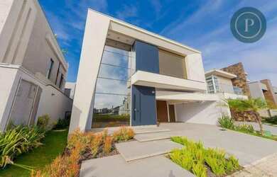 Imagem: A casa em condomínio possui 4 Dormitórios, 5 Banheiros, 4