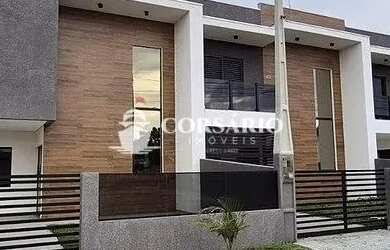 Imagem: A casa possui 3 Dormitórios, 2 Banheiros, 1 Vaga na garagem