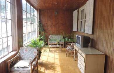 Imagem: A casa à venda possui 4 Dormitórios, 2 Banheiros, 2 Vagas