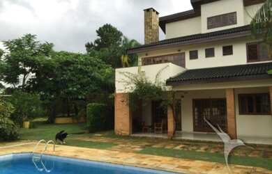 Imagem: A casa possui 4 Dormitórios, 2 Banheiros, 460m² de Área e