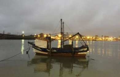 Imagem: A casa possui 2 Dormitórios, 4 Vagas na garagem e está localizado