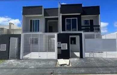 Imagem: A casa possui 3 Dormitórios, 2 Banheiros, 4 Vagas na garagem