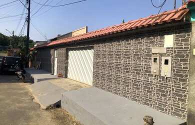 Imagem: A casa possui 2 Dormitórios, 1 Banheiro, 1 Vaga na garagem