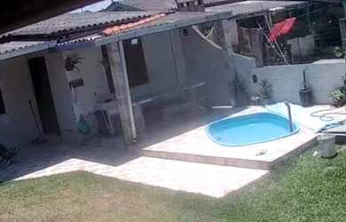 Imagem: A casa possui 3 Dormitórios, 2 Vagas na garagem e está localizado