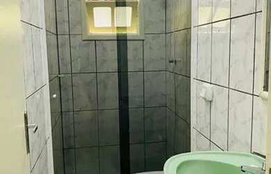 Imagem: A casa possui 4 Dormitórios, 3 Banheiros, 3 Vagas na garagem