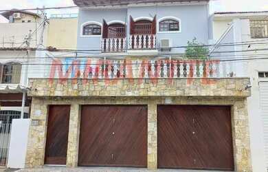 Imagem: A casa possui 4 Dormitórios, 5 Banheiros, 3 Vagas na garagem