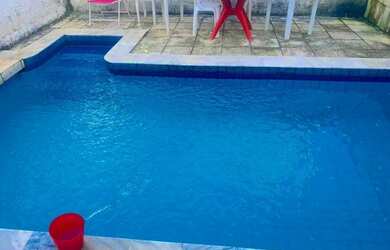 Imagem: A casa possui 3 Dormitórios, 3 Vagas na garagem e está localizado