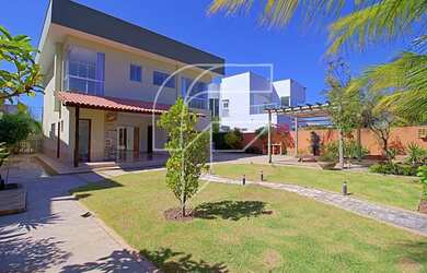 Imagem: A casa possui 4 Dormitórios, 5 Banheiros, 4 Vagas na garagem