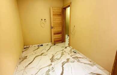 Imagem: A casa possui 3 Dormitórios, 3 Banheiros, 2 Vagas na garagem