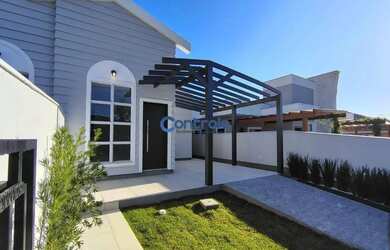 Imagem: A casa possui 3 Dormitórios, 2 Banheiros, 1 Vaga na garagem