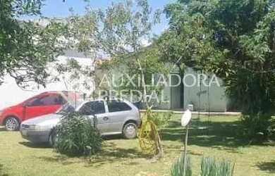 Imagem 16: Terreno de 520 m² arborizado com casa de alvenaria de 2 dormitórios...