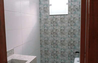 Imagem: A casa possui 3 Dormitórios, 2 Banheiros, 2 Vagas na garagem