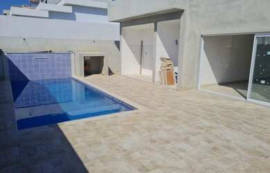 Imagem: A casa em condomínio possui 3 Dormitórios, 2 Banheiros, 2