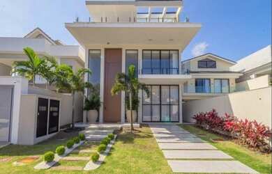 Imagem: A casa em condomínio possui 5 Dormitórios, 5 Banheiros, 2