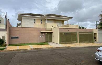 Imagem: A casa possui 5 Dormitórios, 5 Banheiros, 5 Vagas na garagem