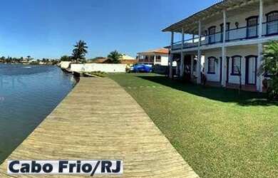 Imagem: A casa possui 5 Dormitórios, 5 Banheiros, 5 Vagas na garagem