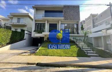 Imagem: A casa em condomínio possui 4 Dormitórios, 5 Banheiros, 5