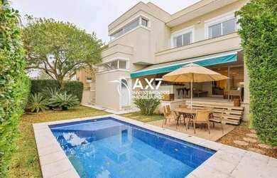 Imagem: A casa em condomínio possui 4 Dormitórios, 5 Banheiros, 4