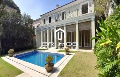 Imagem: A casa possui 4 Dormitórios, 5 Banheiros, 5 Vagas na garagem