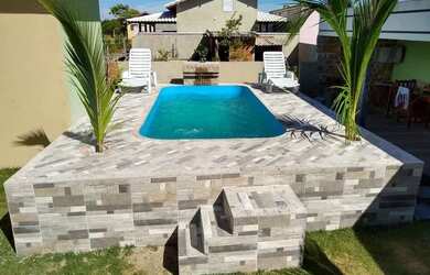 Imagem: A casa possui 3 Dormitórios, 5 Vagas na garagem, Imóvel novo