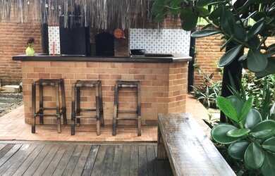 Imagem: A casa possui 3 Dormitórios, 3 Vagas na garagem e está localizado