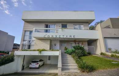 Imagem: A casa em condomínio possui 4 Dormitórios, 5 Banheiros, 5