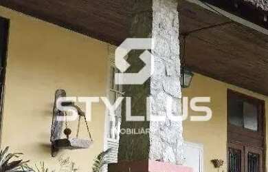 Imagem: A casa possui 5 Dormitórios, 4 Banheiros, 4 Vagas na garagem