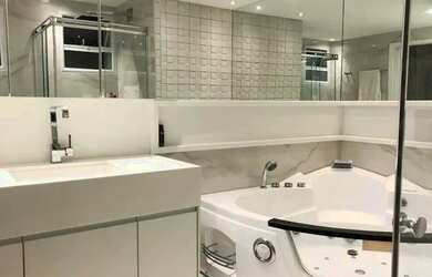 Imagem: O apartamento possui 3 Dormitórios, 5 Banheiros, 2 Vagas na