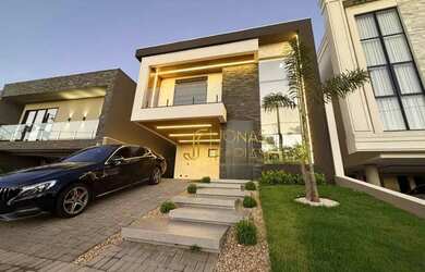 Imagem: A casa possui 3 Dormitórios, 4 Banheiros, 4 Vagas na garagem