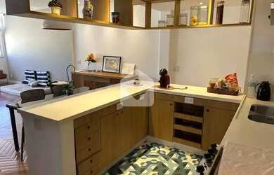 Imagem 8: Cobertura duplex reformada por arquiteta Vista espetacular das montanhas!