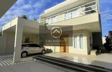 Imagem: A casa possui 4 Dormitórios, 5 Banheiros, 5 Vagas na garagem