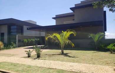 Imagem: A casa possui 3 Dormitórios, 5 Banheiros, 5 Vagas na garagem