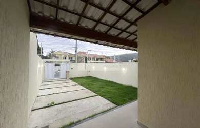 Imagem: A casa possui 3 Dormitórios, 3 Banheiros, 3 Vagas na garagem