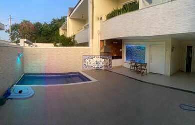 Imagem: A casa em condomínio possui 5 Dormitórios, 5 Banheiros, 2