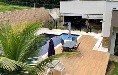 Imagem: A casa em condomínio à venda possui 5 Dormitórios, 5 Banheiros