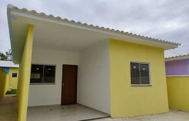 Imagem: A casa possui 2 Dormitórios, 3 Banheiros, 2 Vagas na garagem