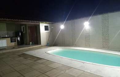 Imagem: A casa possui 5 Dormitórios, 3 Vagas na garagem e está localizado