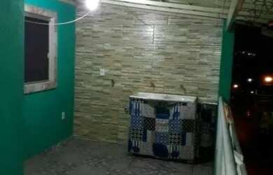 Imagem: A casa possui 3 Dormitórios, 2 Banheiros e está localizado