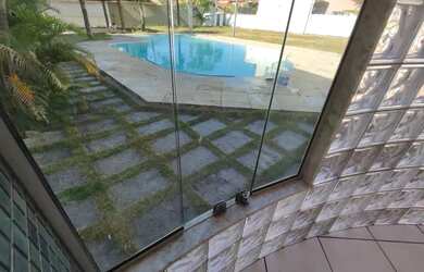 Imagem: A casa possui 5 Dormitórios, 4 Banheiros, 3 Vagas na garagem