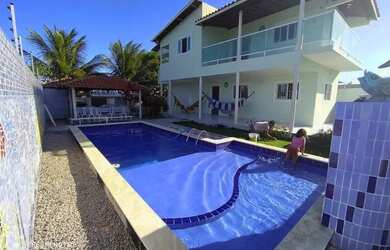 Imagem: A casa possui 4 Dormitórios, 5 Banheiros, 5 Vagas na garagem