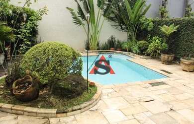 Imagem: A casa possui 3 Dormitórios, 4 Banheiros, 4 Vagas na garagem