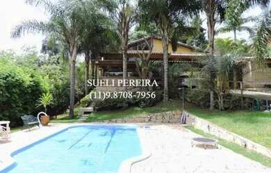 Imagem: A casa possui 5 Dormitórios, 5 Banheiros, 5 Vagas na garagem