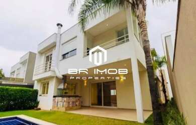 Imagem: A casa possui 4 Dormitórios, 5 Banheiros, 5 Vagas na garagem