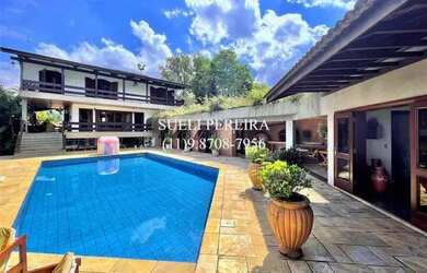 Imagem: A casa em condomínio possui 5 Dormitórios, 5 Banheiros, 5